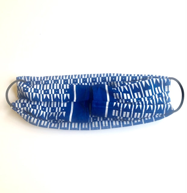 Folded as face mask with hair ties (back)