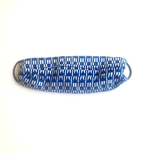 Folded as face mask with hair ties (not included)