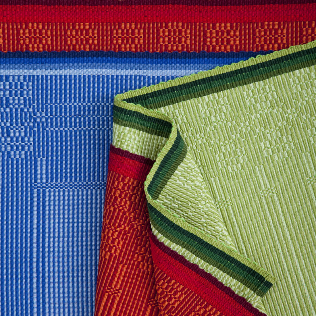 Hand-Loomed Table Linens in Blue, Red, and Green