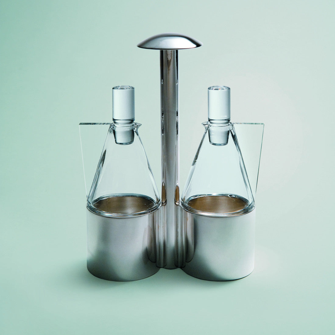 Sterling silver cruet stand with pair of Bohemian crystal carafes
